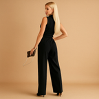 Elegant wrap jumpsuit for women with flattering tailored fit and wide-leg design, perfect for formal events, business meetings, or evening occasions.