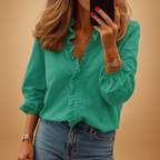 Elegant ruffled blouse for women with flattering fit and lightweight design, perfect for work, casual, and formal occasions.