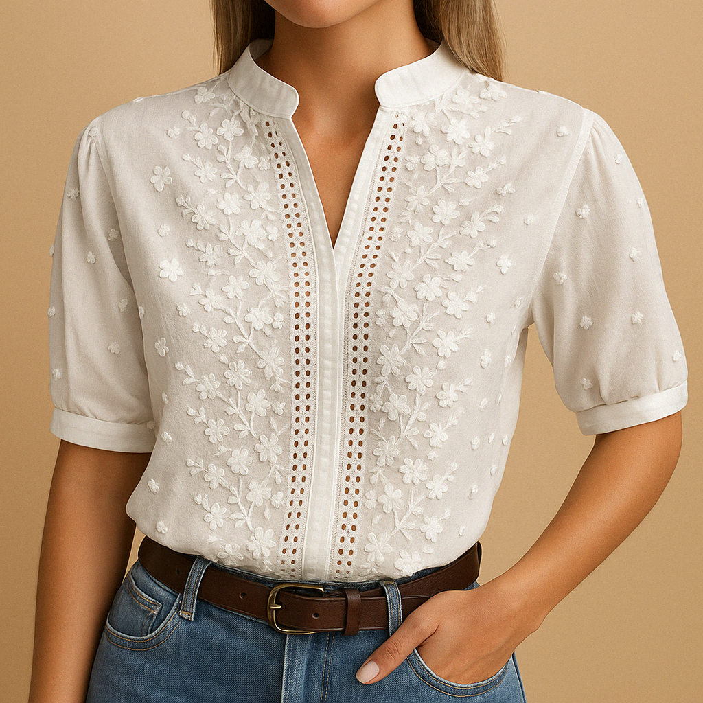 White elegant blouse for women with a classic collar and button-down design, perfect for work, leisure, and evening occasions.