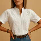 White elegant blouse for women with a classic collar and button-down design, perfect for work, leisure, and evening occasions.