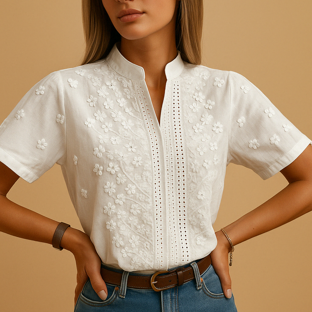 White elegant blouse for women with a classic collar and button-down design, perfect for work, leisure, and evening occasions.